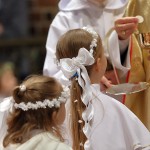 web3-children-going-to-the-first-holy-communion-0a-shutterstock_587731196